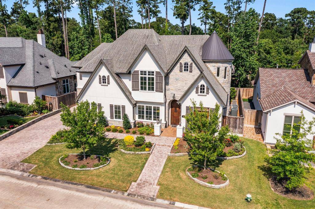 Looking for a newer spacious 5 bedroom home (2 Bedrooms down) in upfront The Woodlands just minutes from I-45? Nestled on a quiet street in a newer subdivision, this luxury home boasts an open-concept design inside with all the must-have features such as a Game room and Media room. Entertain in the back yard featuring a covered porch with Outdoor Kitchen and a patio boasting waterfalls and a fire feature. All this on a wooded greenbelt for privacy!