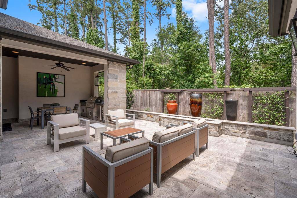 Imagine unwinding by the open fire, surrounded by the soothing sounds of cascading waterfalls and the tranquil ambiance of the wooded greenbelt just beyond—nature’s soundtrack to your perfect retreat.