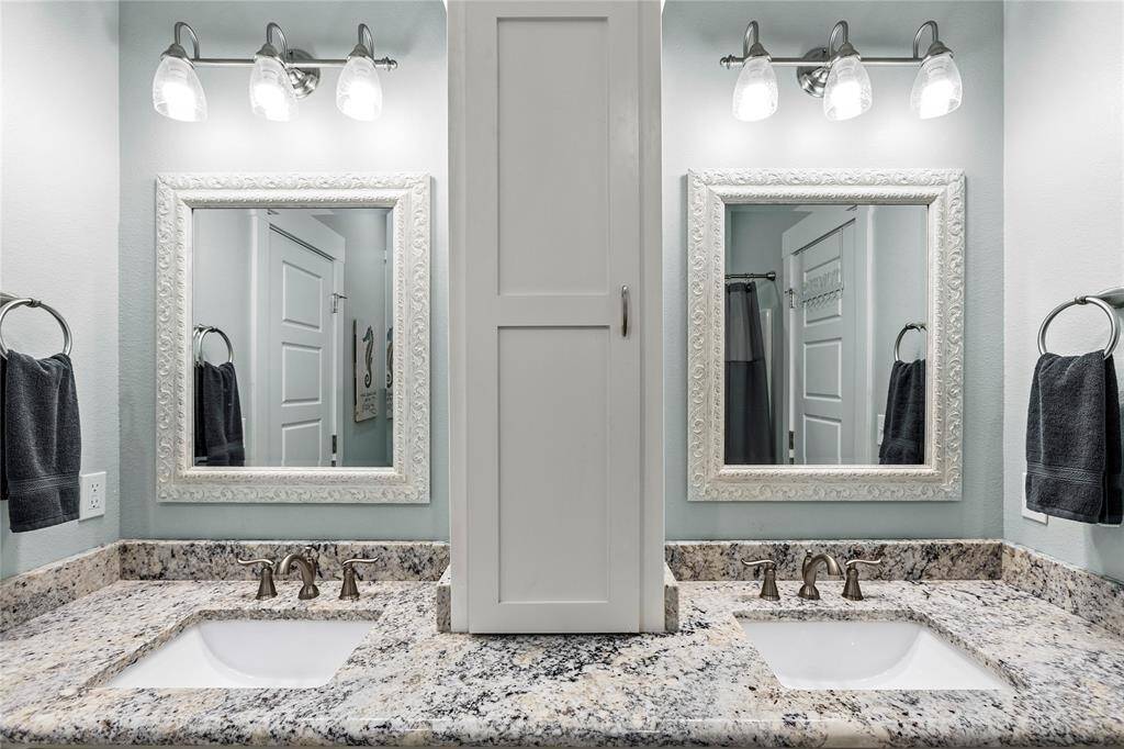 Bathroom 2: Jack-in-jill bathroom has a double vanity and is shared by Bedrooms 2 and 3