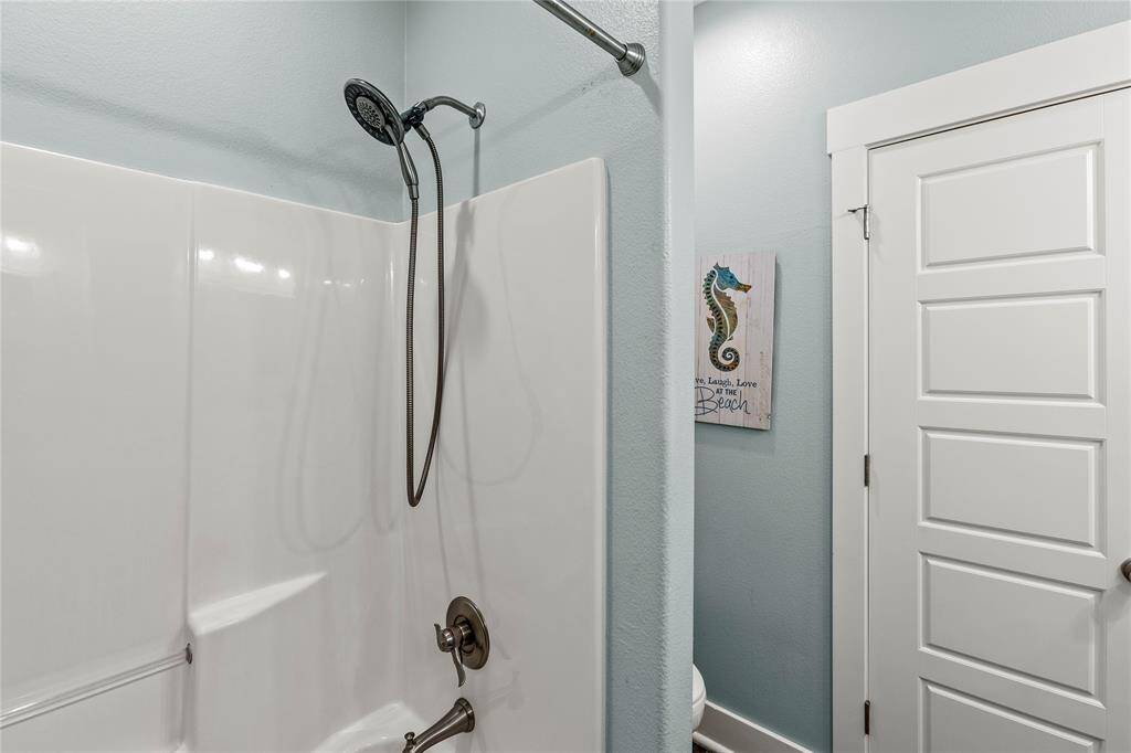 Bathroom 2: Features a tub/shower combo