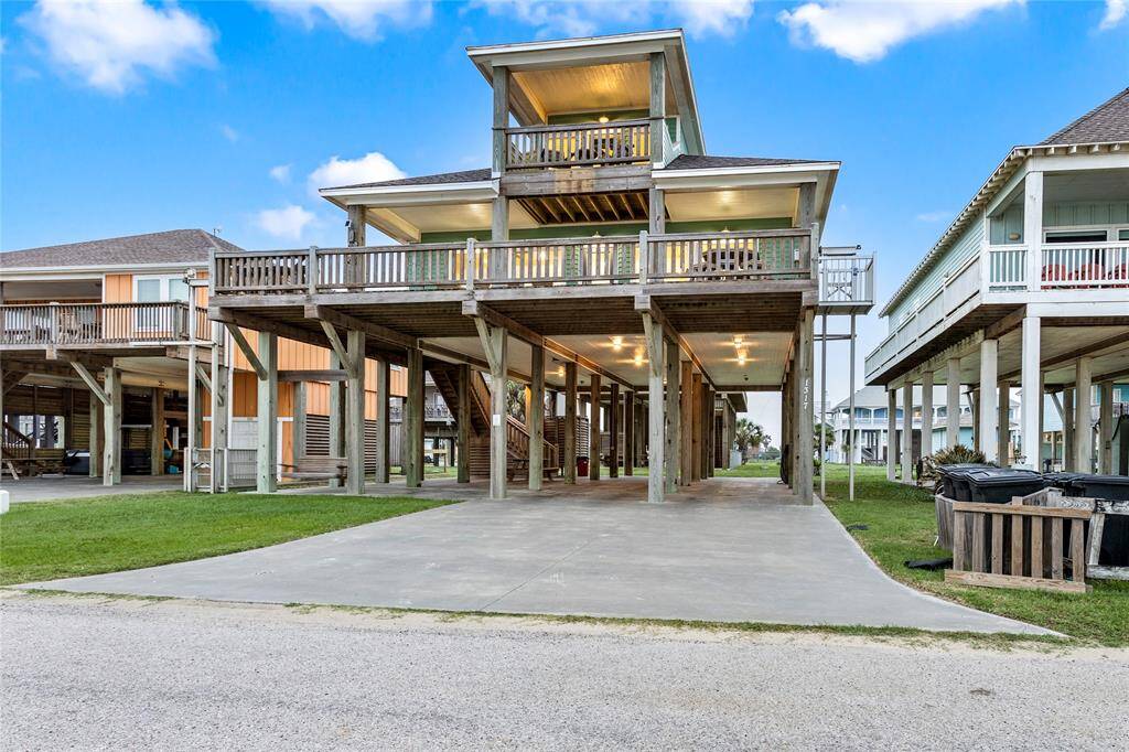 Expansive lower-level deck and private covered deck off of primary suite