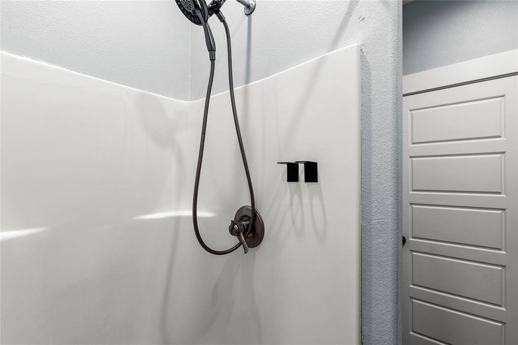 Bath 3: Walk-in shower in bathroom along with closet and an owner's closet nested inside the primary closet