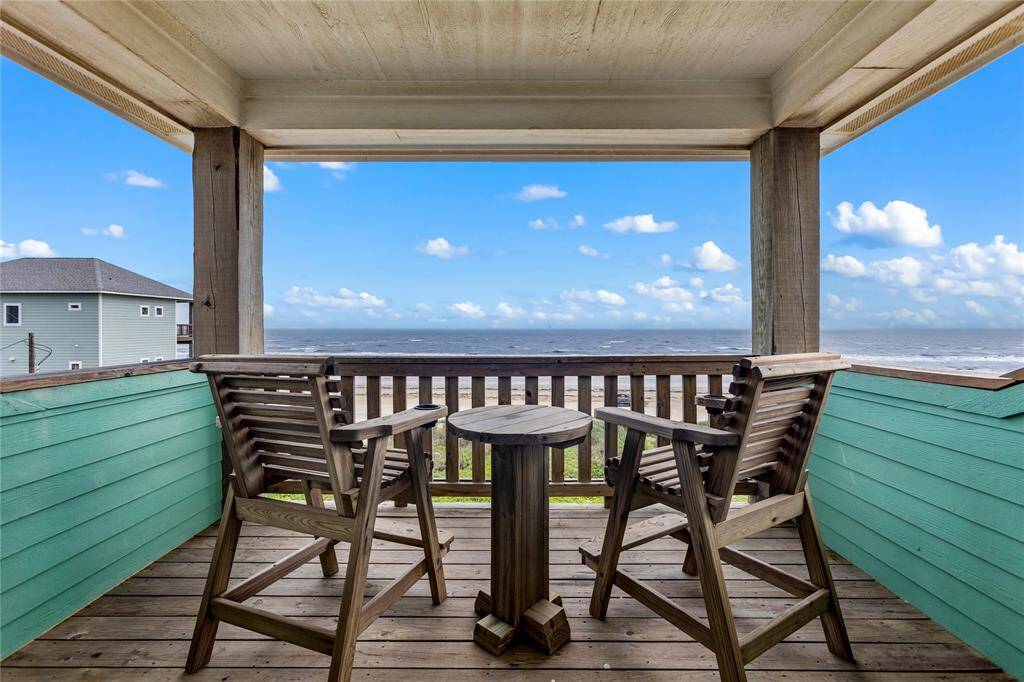 Private covered deck off of primary suite