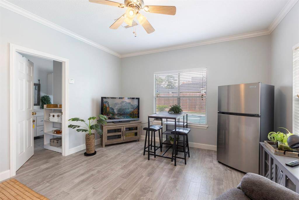 The garage apartment is on the first floor, and it overlooks the pool!