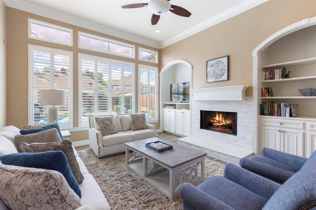 The remodeled fireplace is the center piece of the formal living room. It makes it so cozy and inviting!