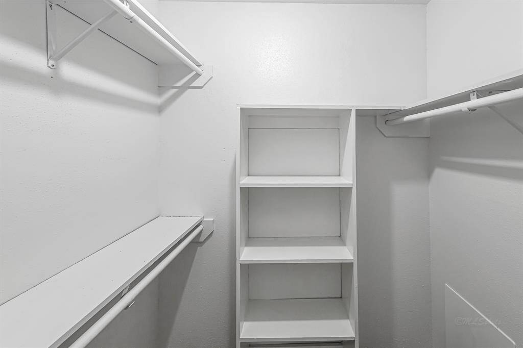 Secondary bathroom with double sinks perfect for growing families.