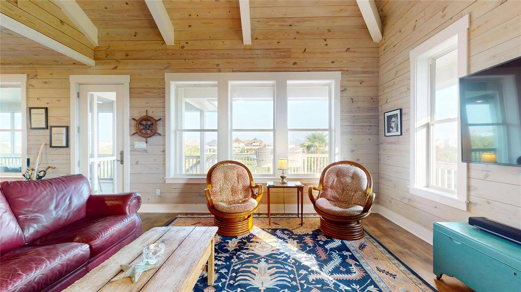 Natural light adorns your living room, and glancing out the window offers a balcony overlooking the nature preserve pond!