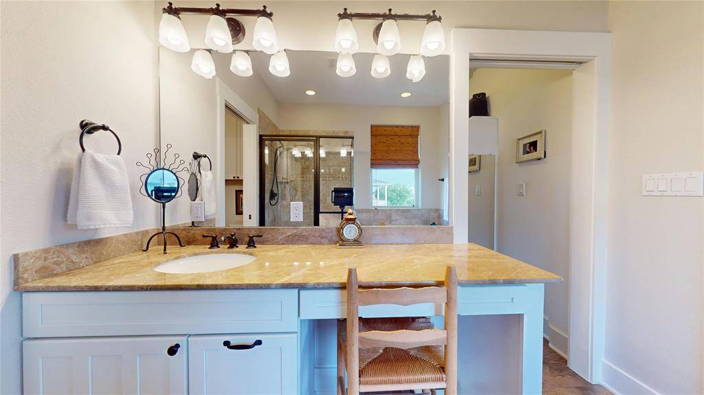 Fabulous vanity with great lighting, offering the perfect "make ready" space