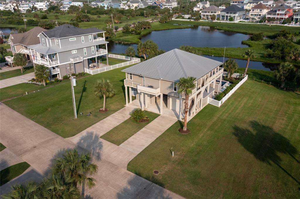 Home overlooks a nature preserve, great for bird watching! Home also features tandem driveways