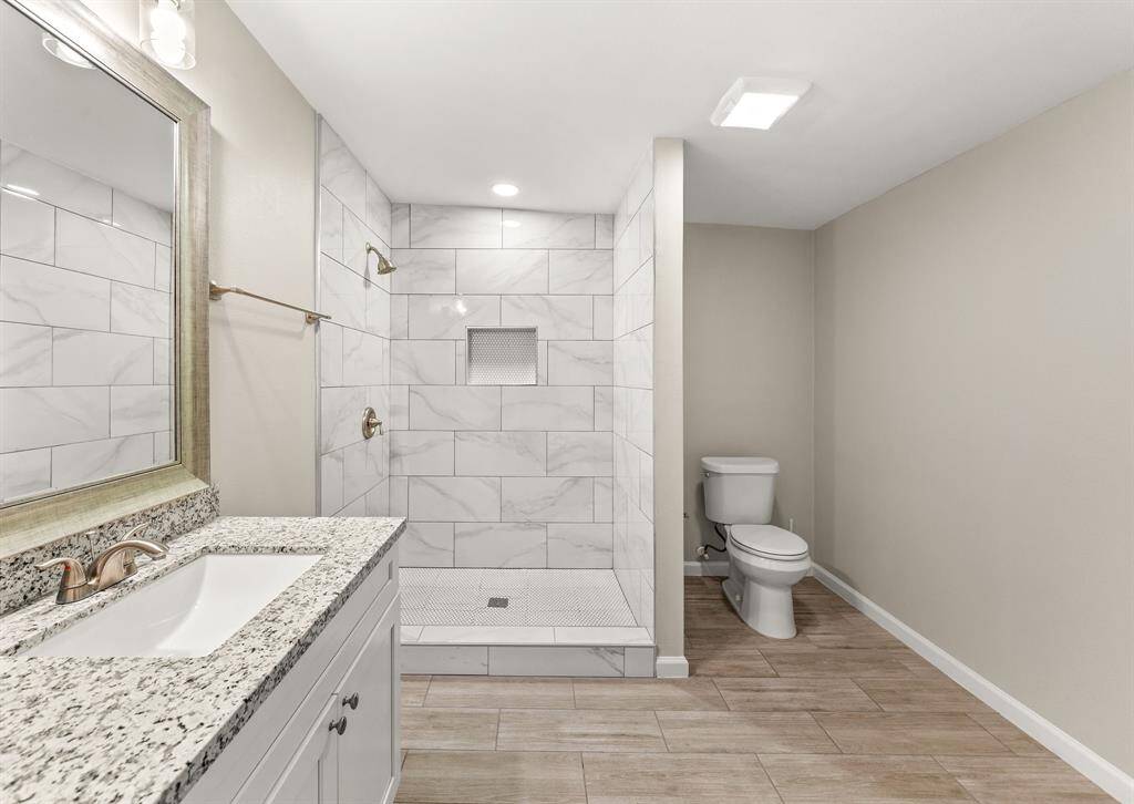 Elegant and roomy primary bathroom