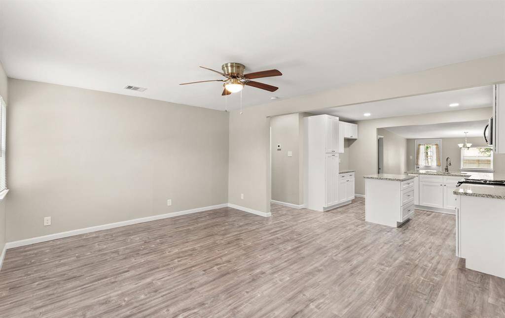 Entrance leads directly to the living room where you find an open concept to the kitchen and dining area