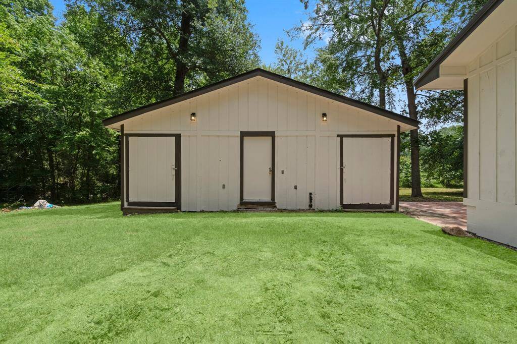 Large exterior shed with separated spaces + NEW ROOF (2025)