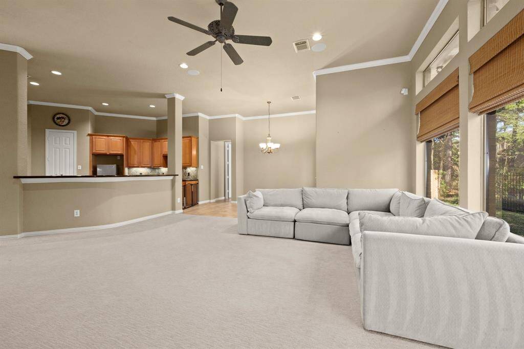 Living Room looking into the kitchen and breakfast area. Notice a big breakfast bar area