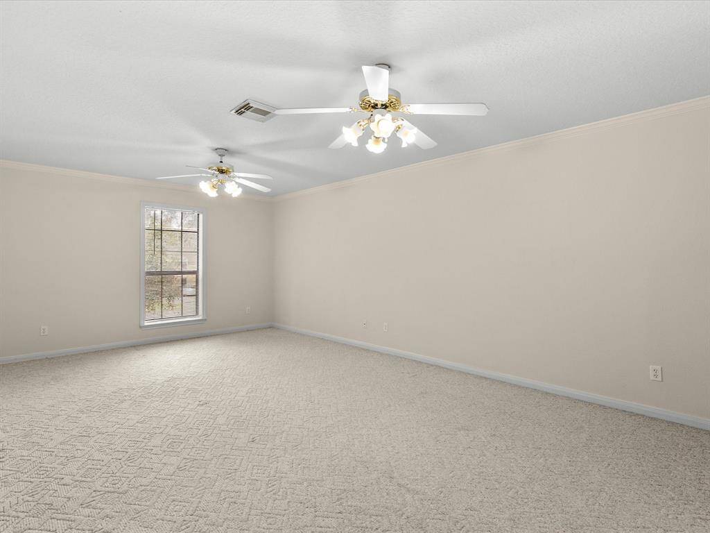 2nd floor bedrooms are large w/neutral colors ceiling fans and lots of closet space