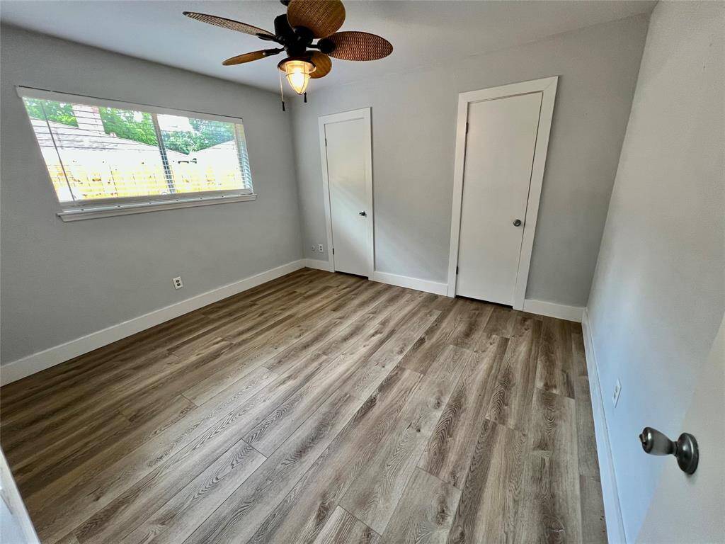 Guest bedroom 2 with double closets.