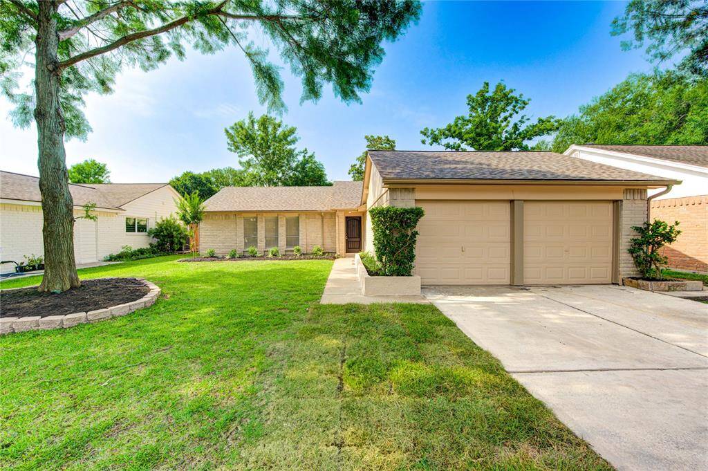 Home features a newer-style roof, fresh exterior paint and new entry door.