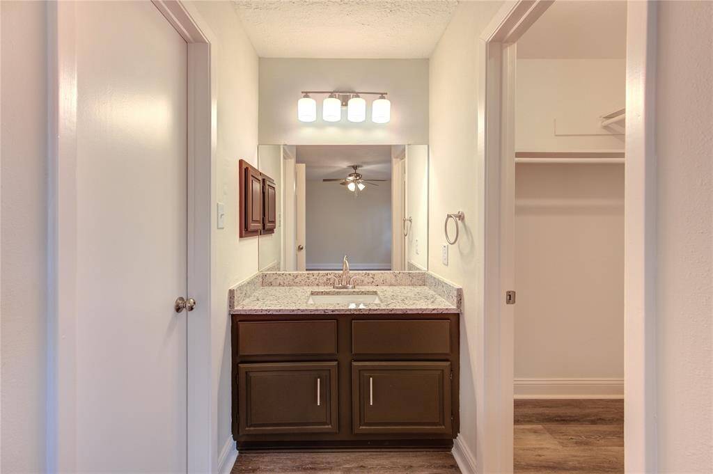 Primary ensuite bathroom and walk-in closet
