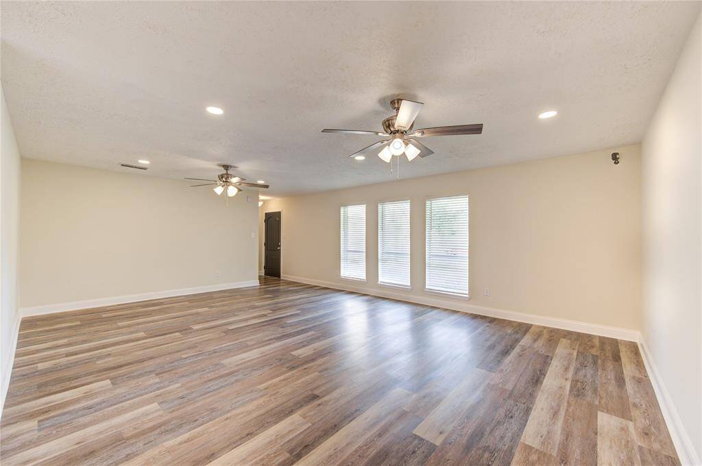The family room is very large and will have no problem holding the largest sectional sofa and a large format TV!