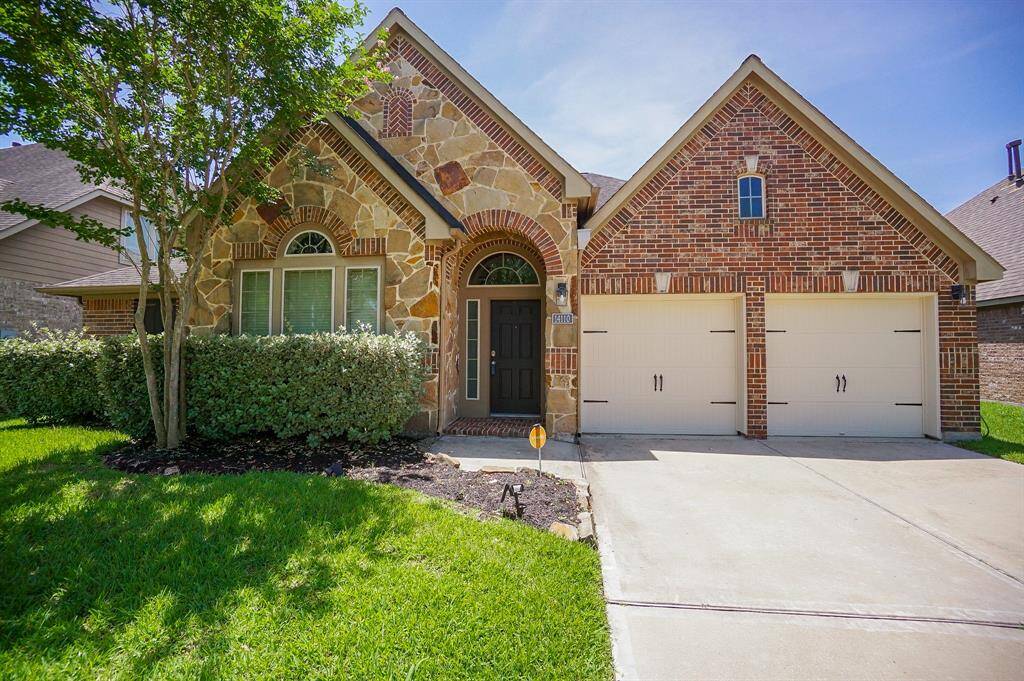 Just look at the gorgeous shade tree on the front lawn! Attentive landscaping welcomes family and guests.