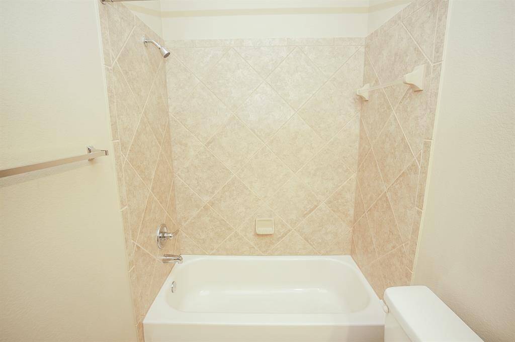 Gorgeous, triangle shaped bath tile, embrace this second Hollywood bath.