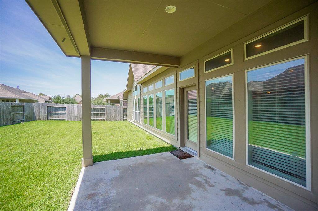 Your huge backyard and covered patio happily invite entertaining and family outings!