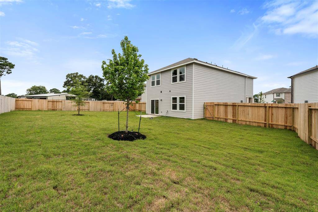 A private backyard space, ready for personal landscaping touches, perfect for outdoor activities and relaxation.