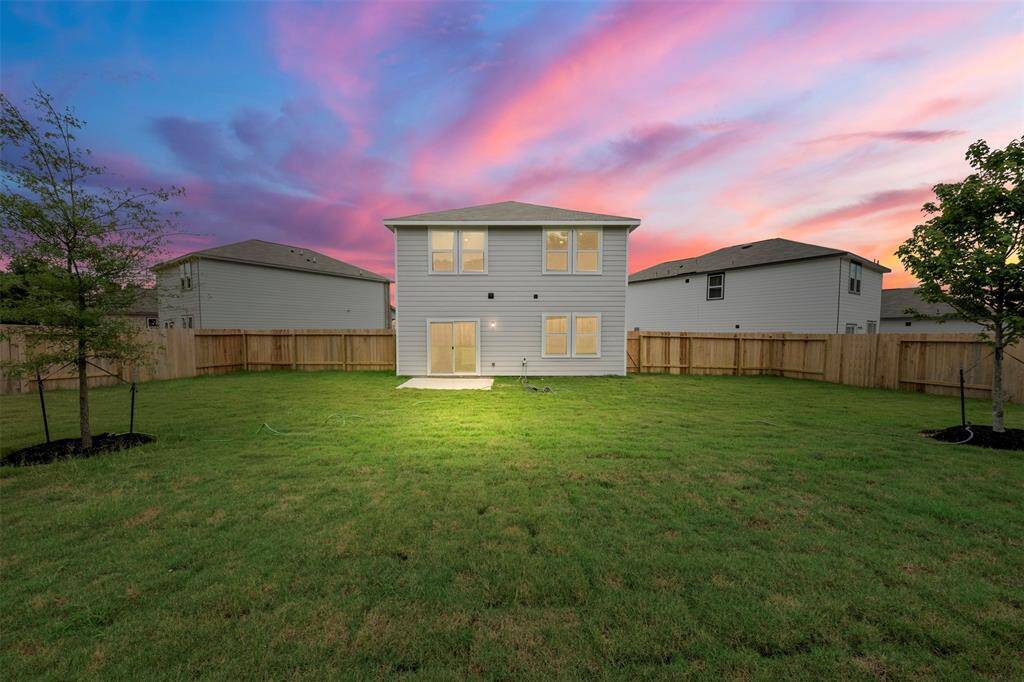 A private backyard space, ready for personal landscaping touches, perfect for outdoor activities and relaxation.