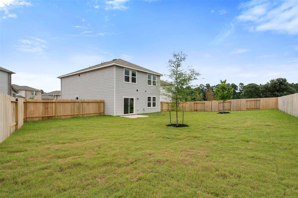 A private backyard space, ready for personal landscaping touches, perfect for outdoor activities and relaxation.