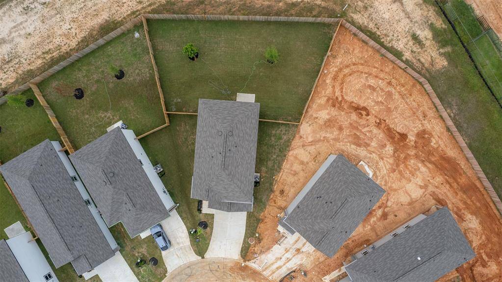 A private backyard space, ready for personal landscaping touches, perfect for outdoor activities and relaxation.