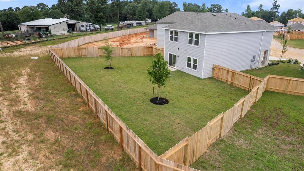 A private backyard space, ready for personal landscaping touches, perfect for outdoor activities and relaxation.