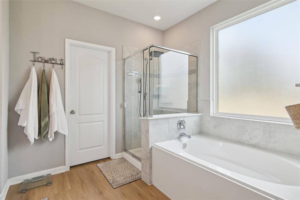 Adjacent to the bathroom, a large master closet offers generous storage and organization for your wardrobe.
