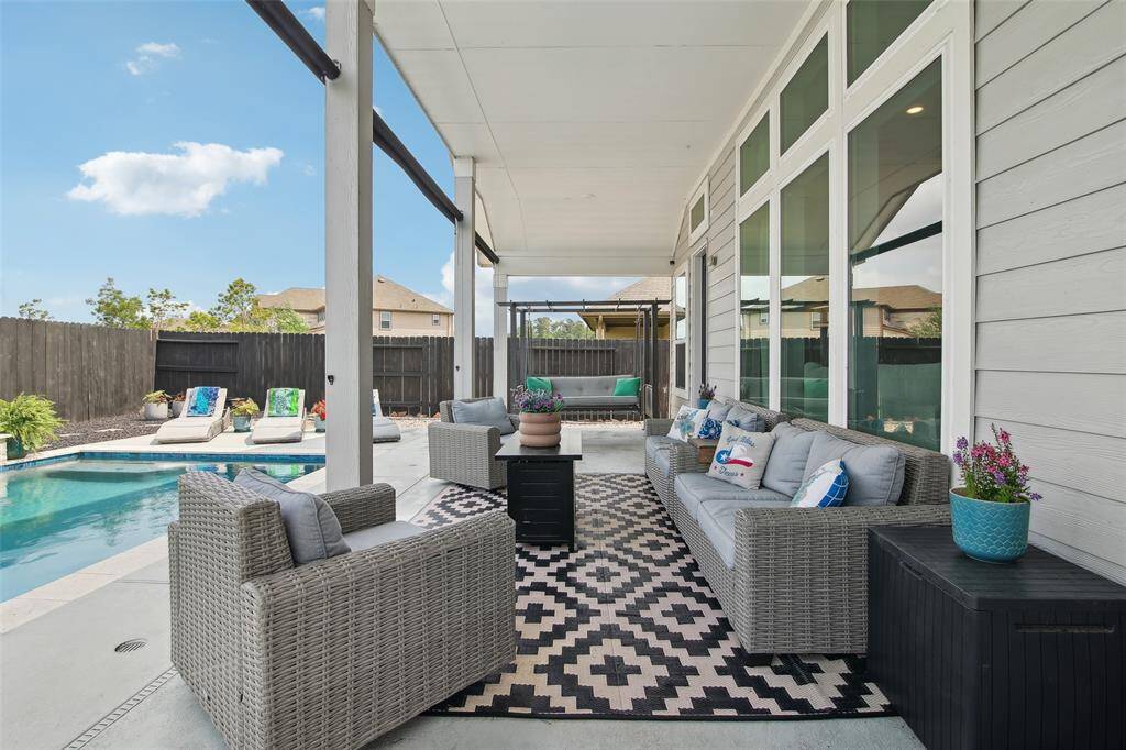 Ample room for seating and a grill makes this backyard perfect for weekend cookouts and celebrations