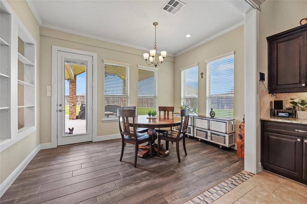 This dining room was added by the seller! Great natural lights and overlooks the backyard!