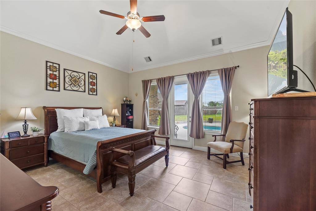 Private owner's retreat with great views of the green backyard and sparkling pool!
