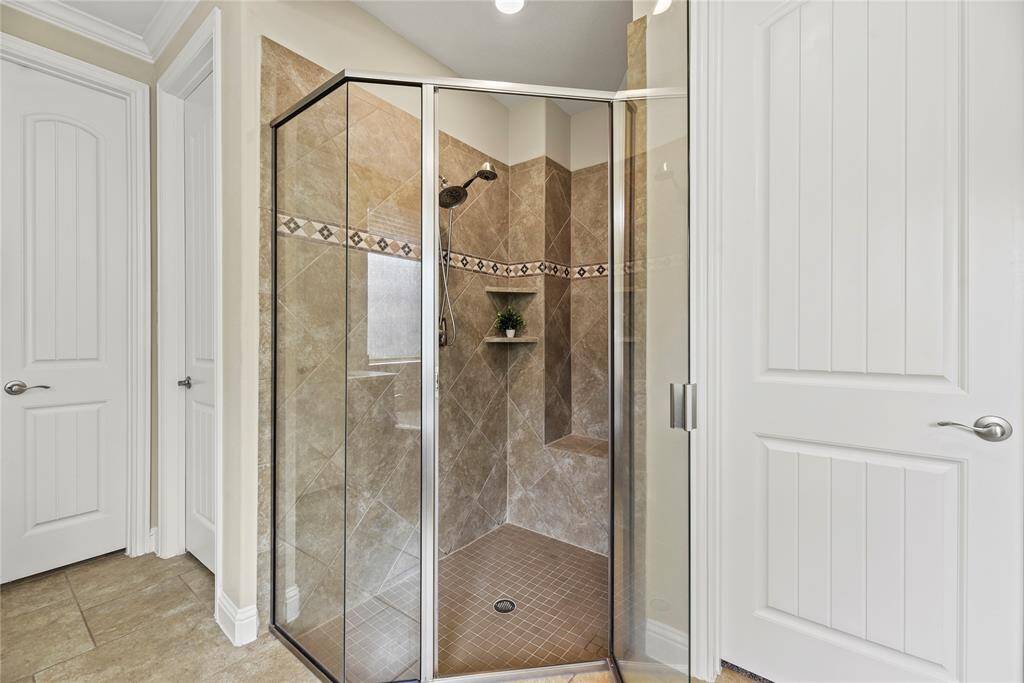 and spacious walk-in shower with mudset.