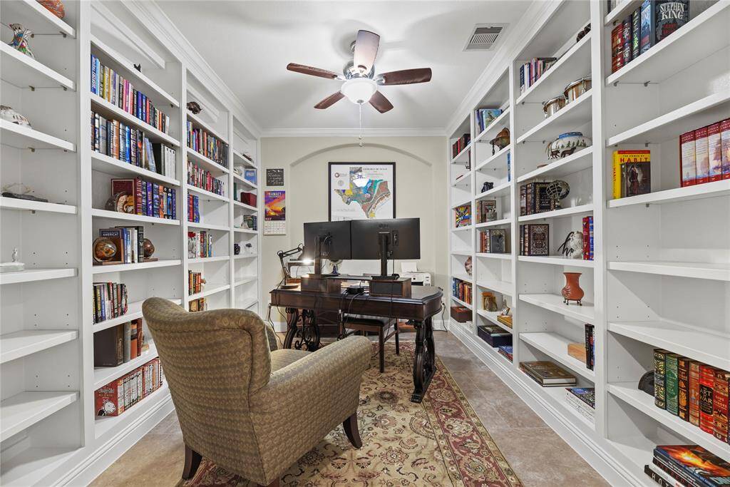 What a great place to work from or read a book! Custom bookshelves!