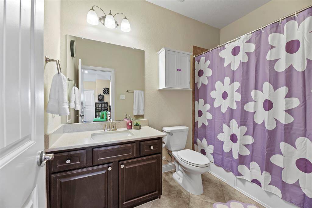 One of two secondary bathrooms upstairs.