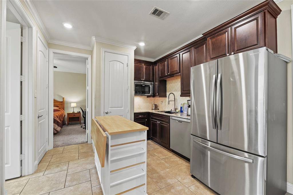 Kitchenette with full size space for a refrigerator, full size dishwasher and microwave!