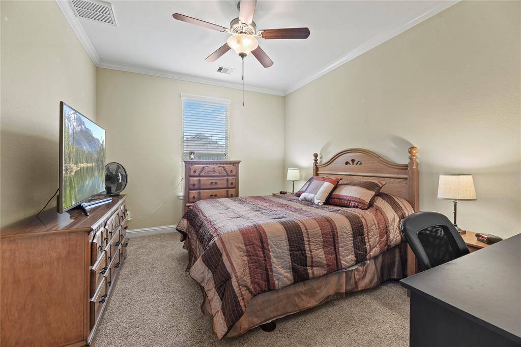 Bedroom with walk-in closet.