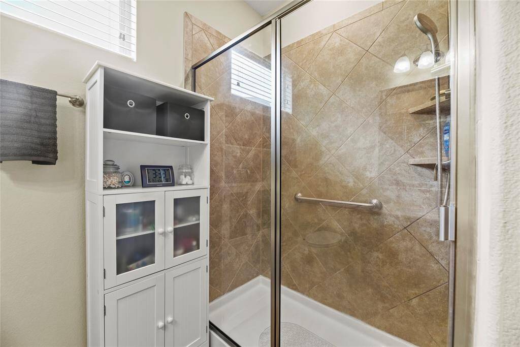 Walk-in shower and linen closet!