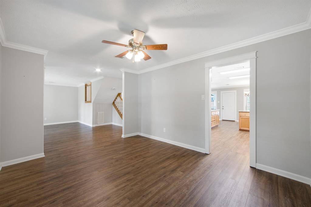 The formal dining room connects seamlessly to the kitchen area.