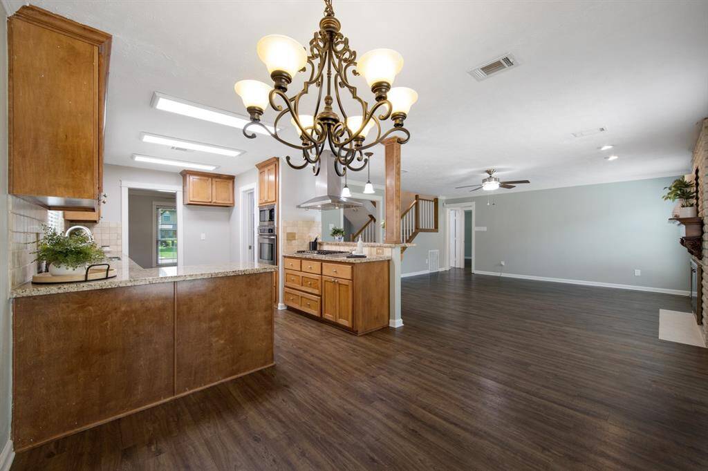 This lighting fixture creates a warm and inviting atmosphere for meals and gatherings.