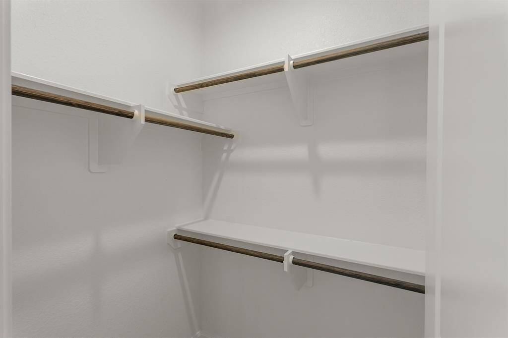 Spacious walk-in closet in the master bedroom.