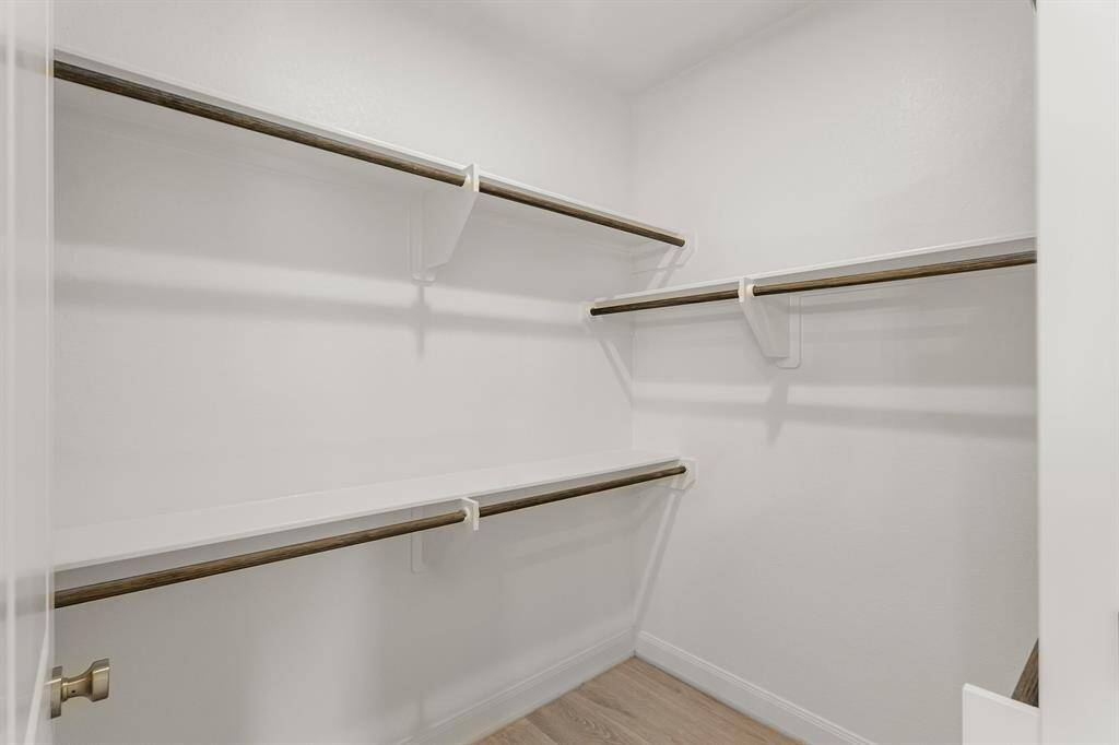 Spacious walk-in closet in the master bedroom.