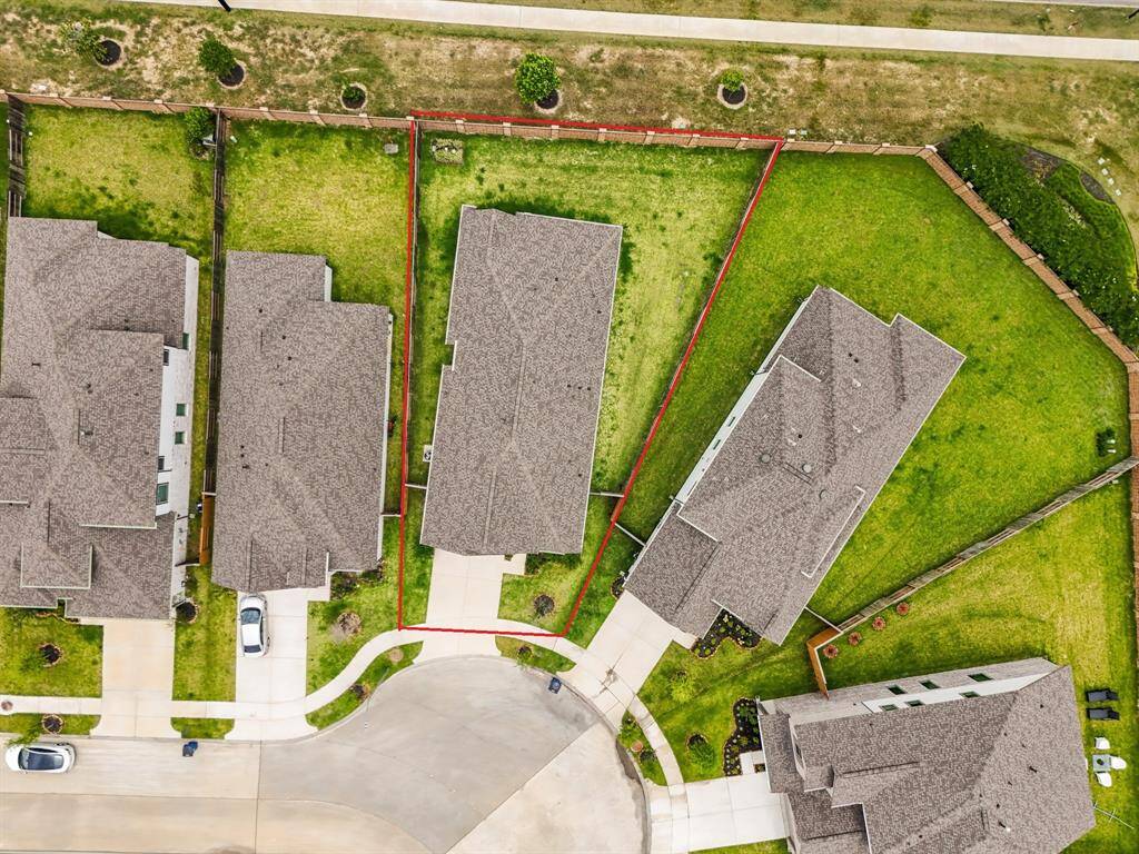 This aerial view showcases the incredible 7,303 sqft Lot.