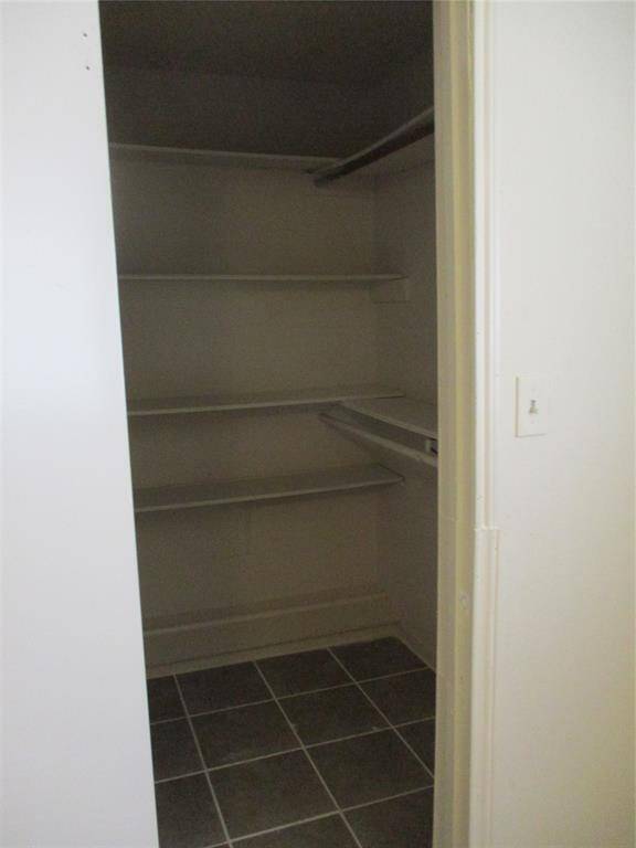 large walk in closet in the 2nd largest bedroom