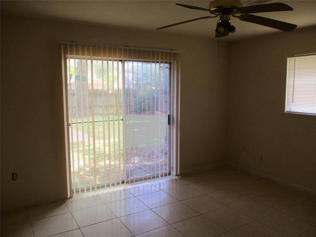 Patio door off master goes out to the back yard