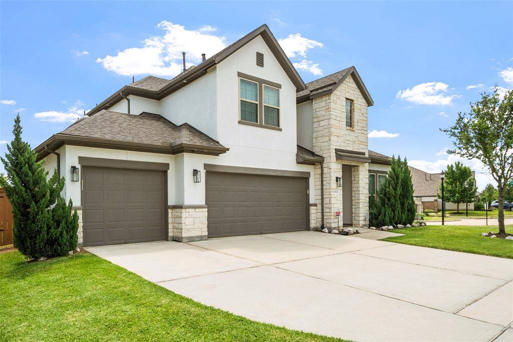 Enhanced curb appeal with elegant outdoor recessed lighting that beautifully highlights the home’s exterior at night.