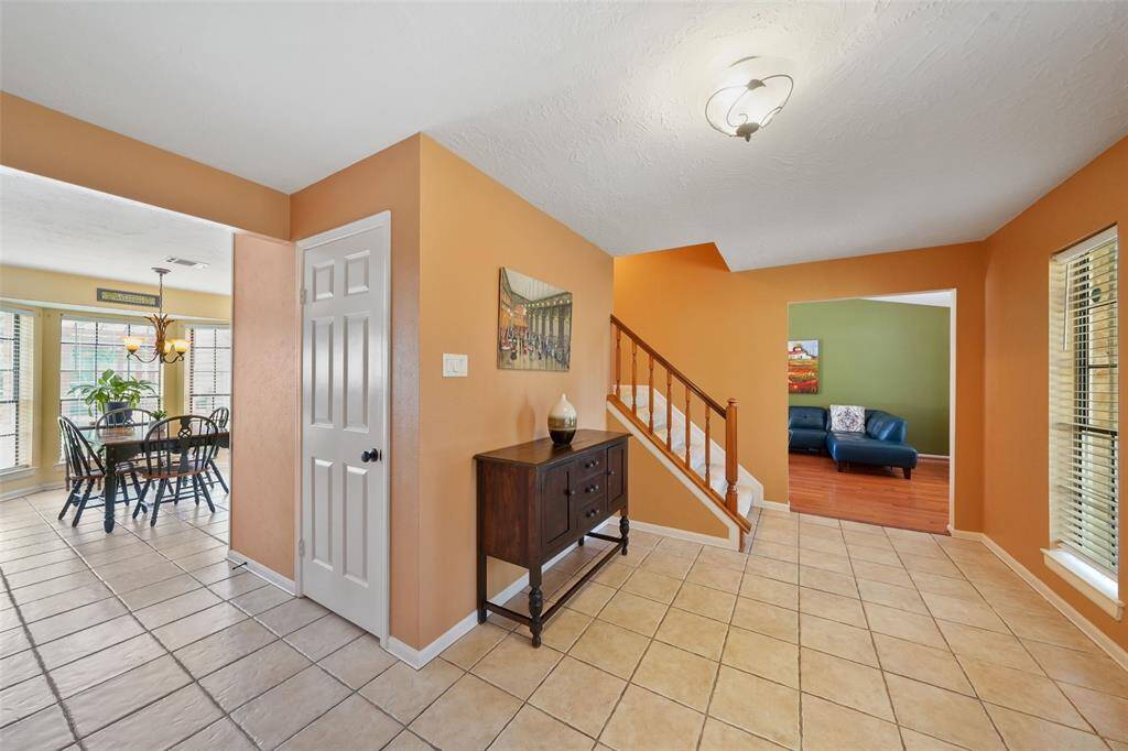 Discover the inviting kitchen and breakfast area, featuring ample natural light and elegant cabinetry.