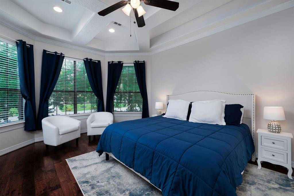 Your primary bedroom suite is roomy, and fully updated in 2024.